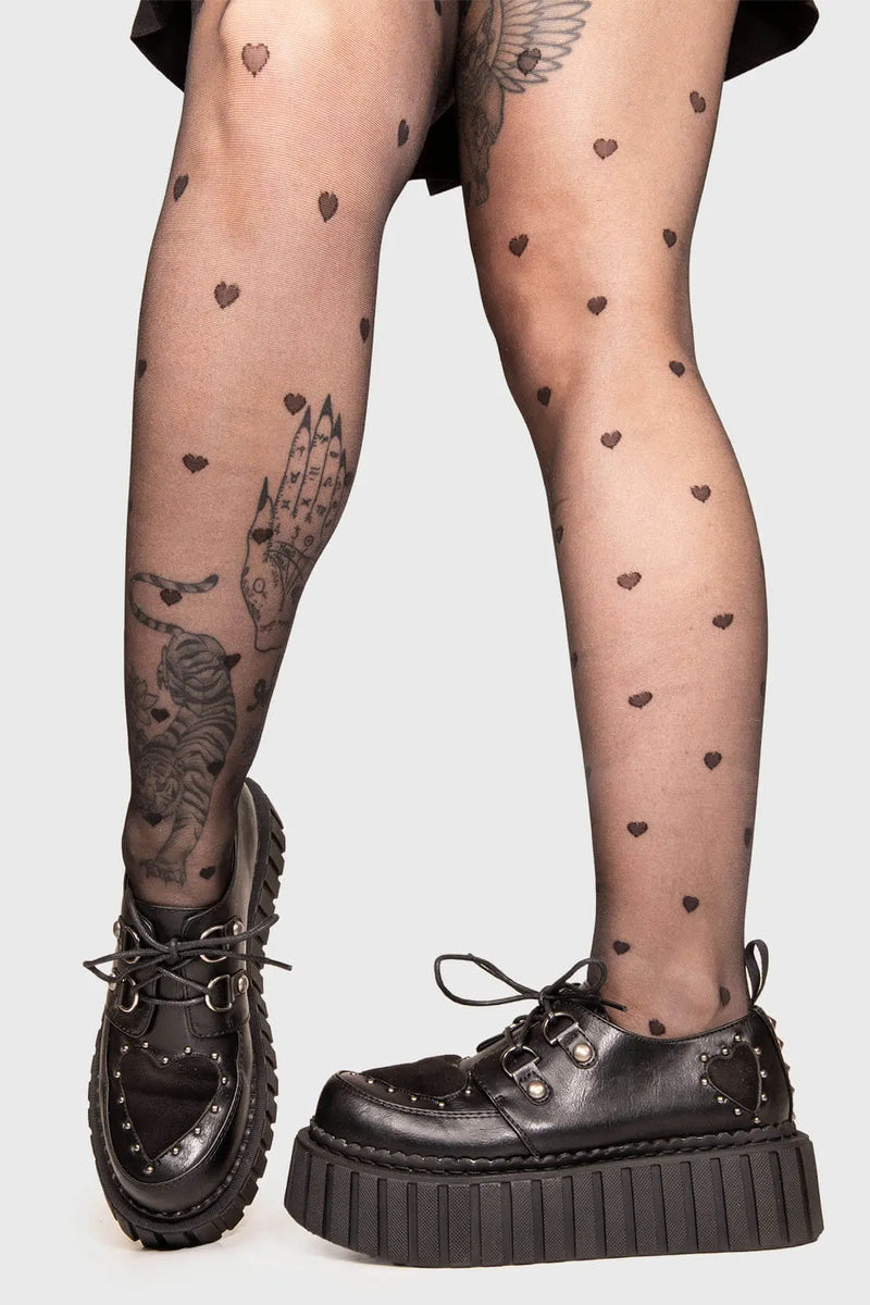 Solemates
 
 Cryptic Love Chunky Creeper Shoes in Black faux leather. These Black vegan creeper shoes feature two black suede hearts on the upper and to the side of the shoe , falling in love one step at a time. Made with eco-friendly materials and 100% cruelty-free, these creeper shoes are as ethical as they are loveable!
 
 
 - Platform Height: 2.3 inch
 - Black laces 
 - Silver eyelets
 - Black suede hearts
 - Silver studs 
 - Chunky Creeper sole
 - Round Toe
 - 100% vegan 
 
 SKU: LMF 1582 - BlackPU