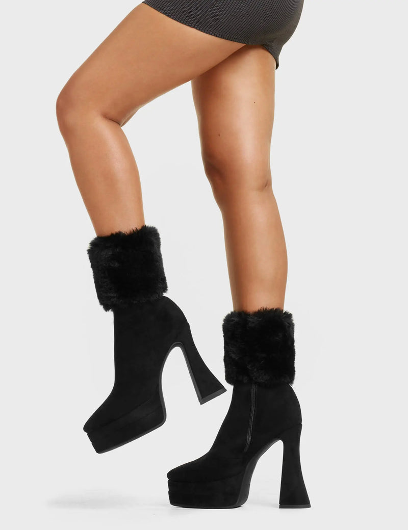 SWEET TOOTH
  
  Cupcake Platform Ankle Boots in Black faux suede. These platform boots feature a sleek look with a curved shaped heel. Also features exuberant fur detailing across the ankle, keeping it nice and classy. Made with eco-friendly materials and 100% cruelty-free, these platform boots are as ethical as they are chic.
  
  - Platform Height
  - Ankle length
  - Fur Detailing
  - Flared Heel
  - High Heel
  - Suede
  - 100% vegan
  
  SKU: LMF 5460 - BlackSUEDE/Fur