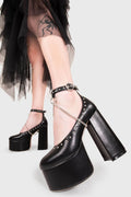 THE SHOEDROBE STAPLE
  
  Watch Me Chunky Mary Jane Shoes in Black faux leather. These Mary Janes feature a Chunky and comfortable Platform sole. Everyone needs a pairs of Mary Janes! Made with eco-friendly materials and 100% cruelty-free, these Sandals are as ethical as they are cute!
  
  
  - Platform Height: 3 inch
  - T Bar structure
  - Square buckle and silver eyelets
  - Chunky Platform sole
  - Round toe 
  - 100% vegan 
  
  SKU: LMS 194 - BlackPU