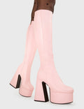 NICE AND SMOOTH
  
  Hate You Platform Knee High Boots in Pink faux leather. These platform boots feature a minimalist look with a Flared heel, keeping it nice and classy. Made with eco-friendly materials and 100% cruelty-free, these platform boots are as ethical as they are chic.
  
  - Platform Height
  - Knee high 
  - Flared heel
  - High Heel
  - 100% vegan 
  
  SKU: LMF 3355 - PinkPU