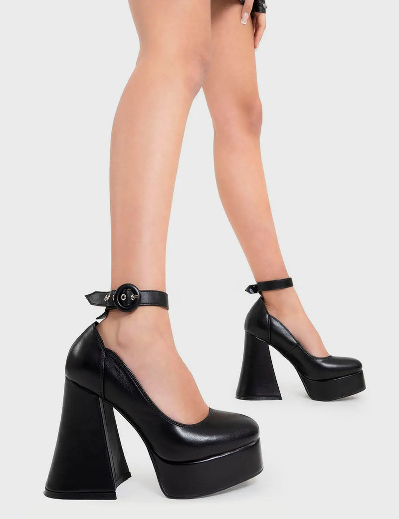 The Main Attraction 

Last Flight Platform Heels in Black faux leather. These heels feature a black adjustable ankle strap with silver eyelets and 'O' ring shaped buckle, let your shoes take you center stage. Made with eco-friendly materials and 100% cruelty-free, these platform boots are as ethical as they are the MAIN ATTRACTION!

- Platform Height
- Heel Height
- Black adjustable ankle strap
- Silver eyelets with 'O' ring shaped buckle
- Platform sole
- Round Toe 
- 100% vegan 

SKU: LMF 2327 - BlackPU