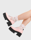 SIMPLY IN LOVE 
  
  Love Story Chunky Mary Jane Shoes in Pink faux leather. These vegan western Boots feature a minimalist design with an adjustable heart buckled straps, very cute. Made with eco-friendly materials and 100% cruelty-free, these boots are as ethical as they are romantic!
  
  
  - Platformed
  - Ankle length
  - Silver heart buckle
  - Chunky black sole
  - Rounded toe 
  - 100% vegan 
  
  SKU: LMF 3901 - PinkPU