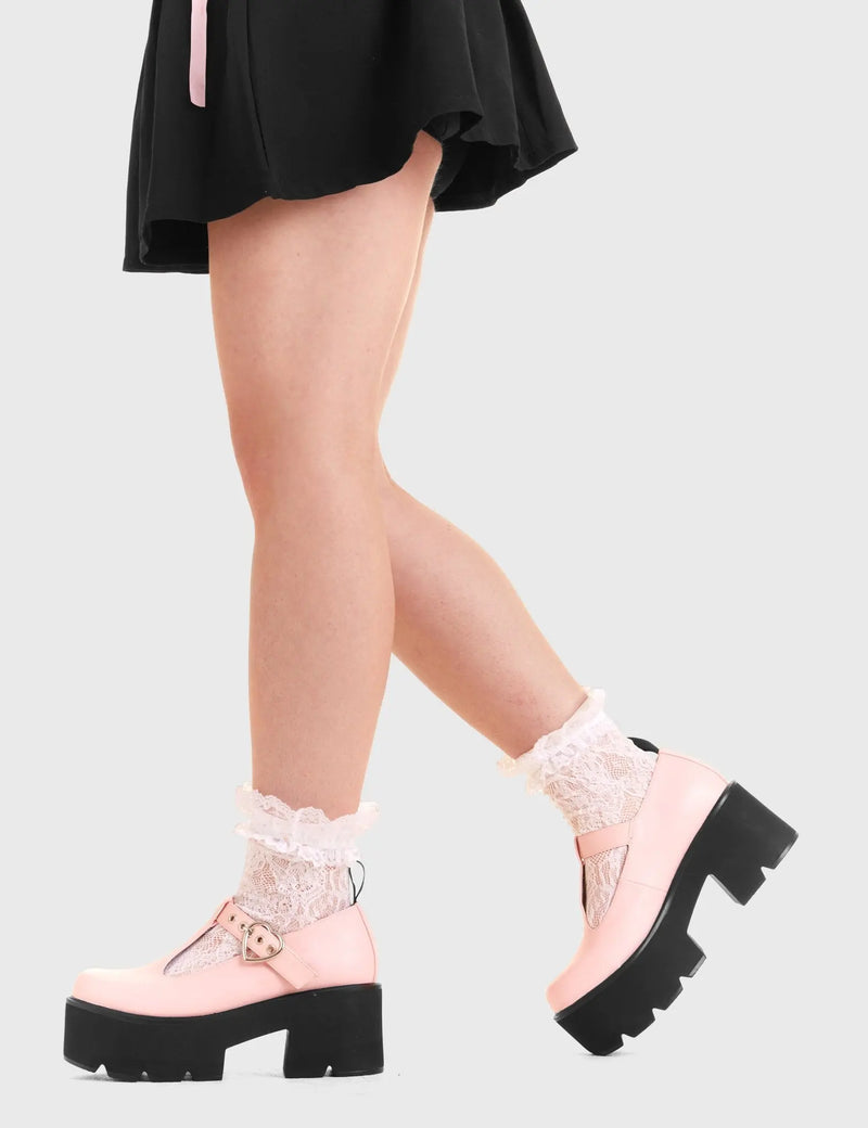 SIMPLY IN LOVE 
  
  Love Story Chunky Mary Jane Shoes in Pink faux leather. These vegan western Boots feature a minimalist design with an adjustable heart buckled straps, very cute. Made with eco-friendly materials and 100% cruelty-free, these boots are as ethical as they are romantic!
  
  
  - Platformed
  - Ankle length
  - Silver heart buckle
  - Chunky black sole
  - Rounded toe 
  - 100% vegan 
  
  SKU: LMF 3901 - PinkPU