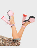 HEARTBEAT
  
  Lullaby Platform Sandals in Pink Faux Leather. These platform sandals feature a adjustable ankle strap across the upper with silver eyelets and studded 'O' ring shaped buckle, Also features a heart shaped heel with a red heart at the bottom. Made with eco-friendly materials and 100% cruelty-free
  
  - Platform Height
  - Heel Height
  - Adjustable ankle strap
  - Studded 'O' ring shaped buckle
  - Silver eyelets
  - Platform sole
  - Round Toe
  - 100% vegan
  
  SKU: LMF 4593 - PinkPU