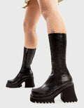 Not Your Basic Boots
  
  Mind Pool Chunky Platform Calf Boots in Black faux leather. These platform boots feature a minimalist design, with a chunky sole, the perfect way to elevate any look. Made with eco-friendly materials and 100% cruelty-free, these platform boots are as ethical as they are cool.
  
  - Platform Height
  - Heel Height
  - Black Zip
  - Shark's teeth grip
  - Chunky Platform sole
  - 100% vegan 
  
  SKU: LMF 2914 - BlackPU
