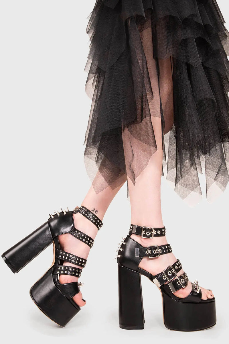 IT'S ALL IN THE DETAILS!

Revin' Plaform Sandals in Black faux leather. These vegan Platform Sandals feature silves spikes with a Platform sole and high heel, perfect for adding height and glamour to any outfit. Made with eco-friendly materials and 100% cruelty-free, these Sandals are as ethical as they are badass!


- Platform Height: 2.5 inch
- Heel Height: 5.5 inch 
- Open Toe
- Adjustable ankle straps
- Silver spikes & studs
- High Platform sole
- Round toe 
- 100% vegan 

SKU: LMS 195 - BlackPU
