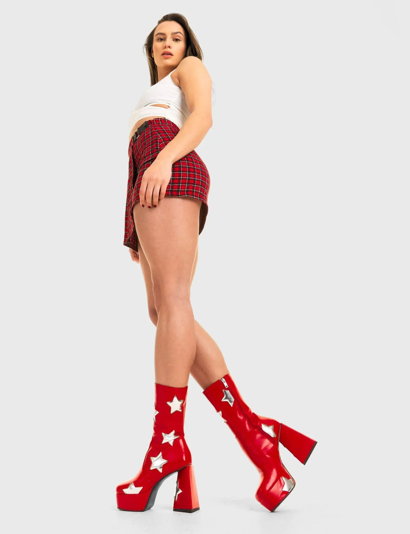 DISCO FEVER 
  
  Seeking Stars Platform Ankle Boots in Red faux leather. These platform boots feature a red boot with silver stars all over. Made with eco-friendly materials and 100% cruelty-free, these platform boots are as ethical as they are chic.
  
  - Platform Height
  - Silver stars
  - Calf length
  - Triangle heel
  - High Heel
  - 100% vegan 
  
  SKU: LMF 3338 - RedPU/SilverStar